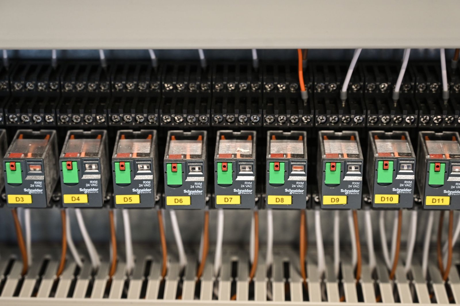 Electrical relays and control wiring in an industrial panel
